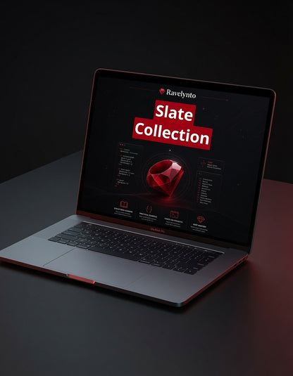A silver laptop on a dark surface displaying a website banner for 'Ravelynto Slate Collection' with a red gem graphic on a black screen.